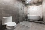 New Wet room master bathroom after Renowned Renovation Uptown Condo Bathroom Remodel