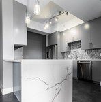 Concrete-Finished-Kitchen-The-Renaissance-on-Turtle -Creek-Condo-After-Remodeling