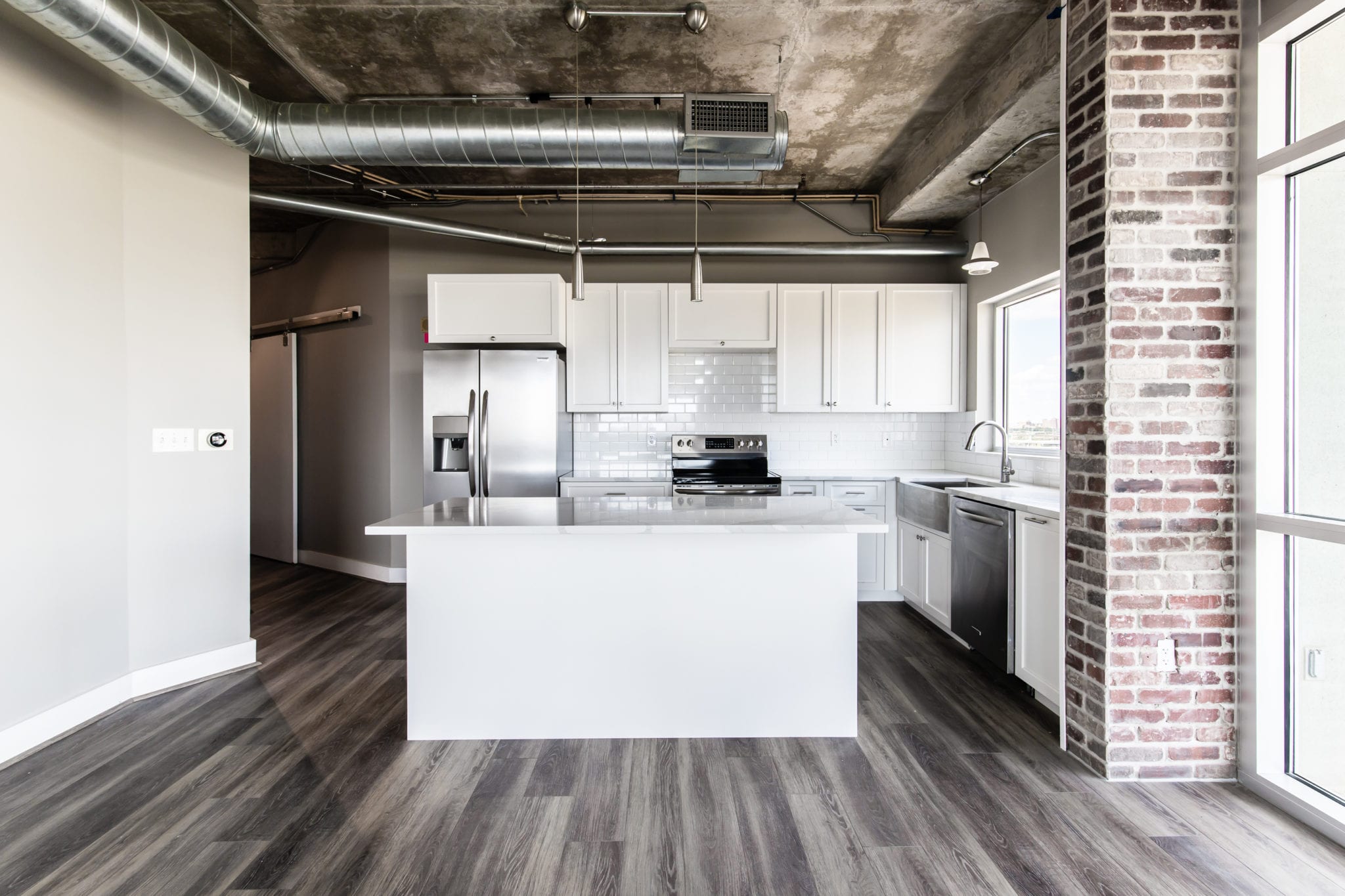 Mid-Rise-Dallas-Condo-Kitchen-After-Remodeling-with-extremely durable luxury vinyl floor by Shaw Floors. ALL ABOUT ‘TIVOLI PLUS’