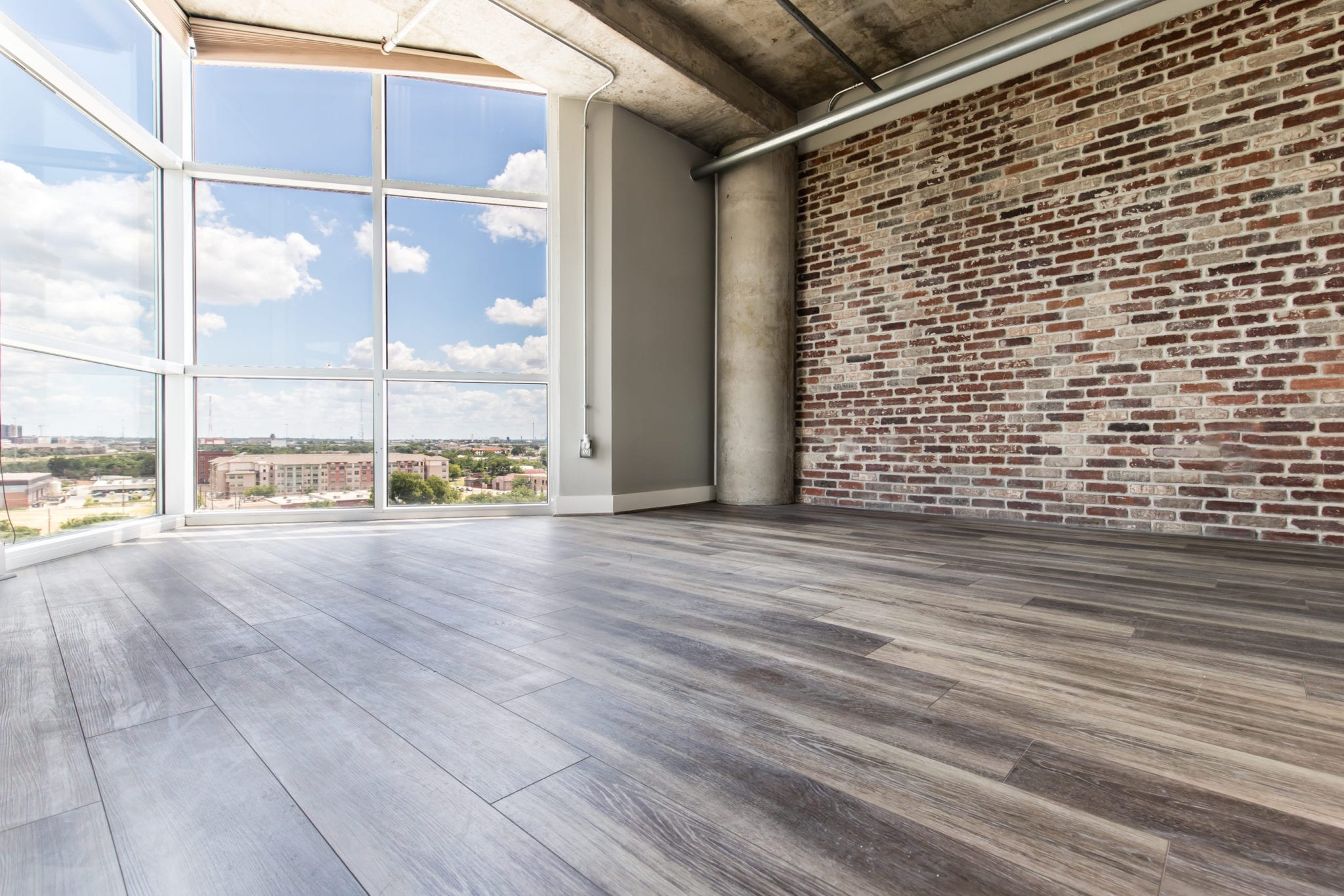 Mid-Rise-Dallas-Condo-Living-Room-Floor-After-Remodeling-Dallas-TX-75215
