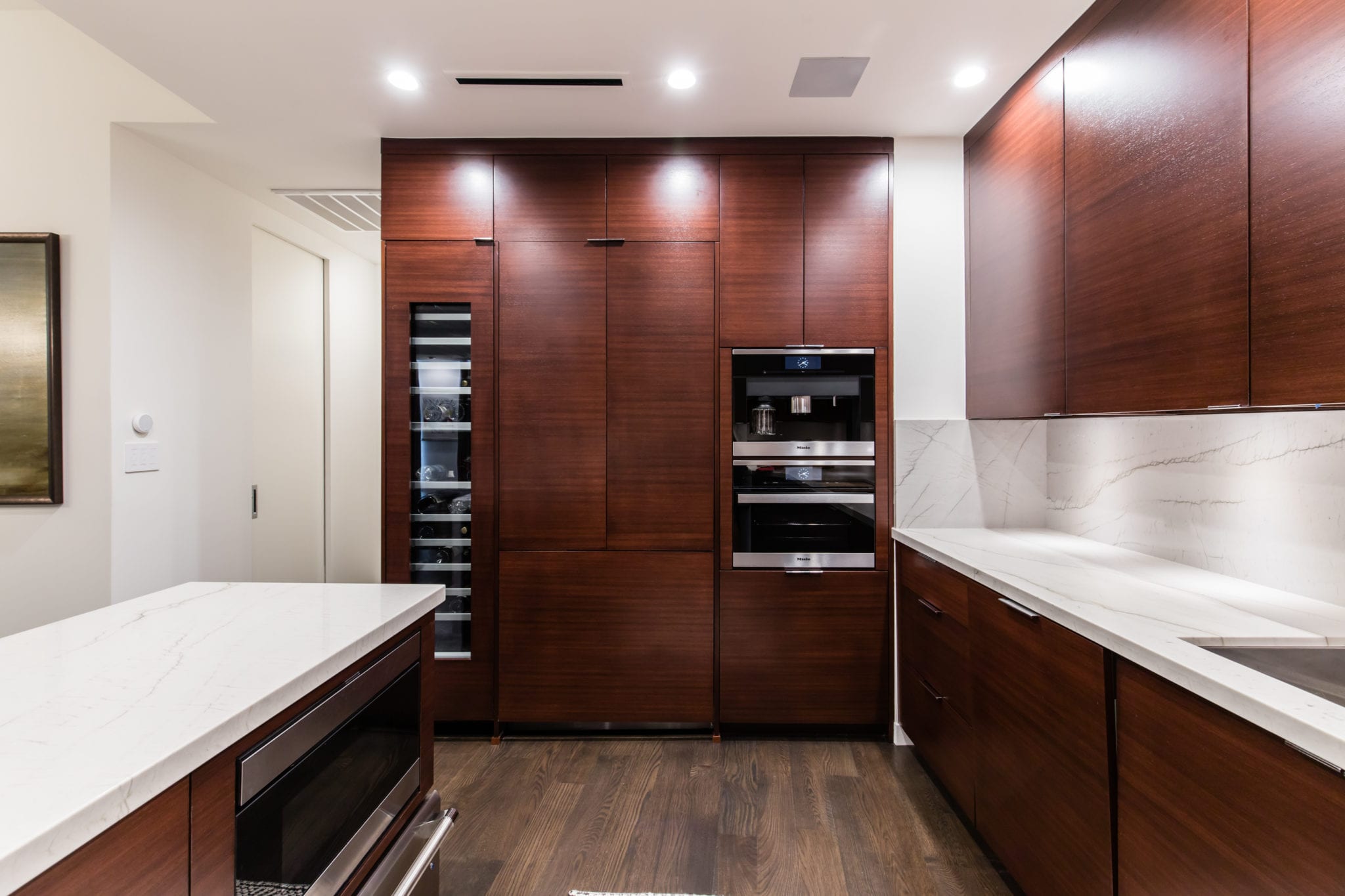 Kitchen-2-story-high-rise-condo-remodel-The-Travis-Katy-Trail-Kitchen-Cabinets-with-panel-ready-refrigerator
