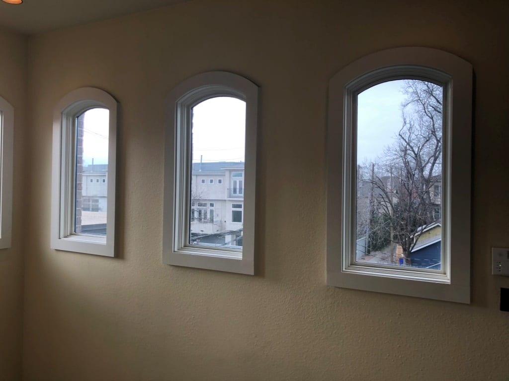 Turtle-Creek-town-Hone-Windows Before Hunter Douglas Shades in Stairwell