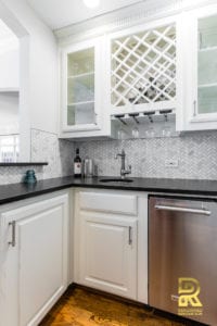 Wet Bar with Wine Rack in Highpark TX Single Family Home after Remodeling by Renowned Renovation