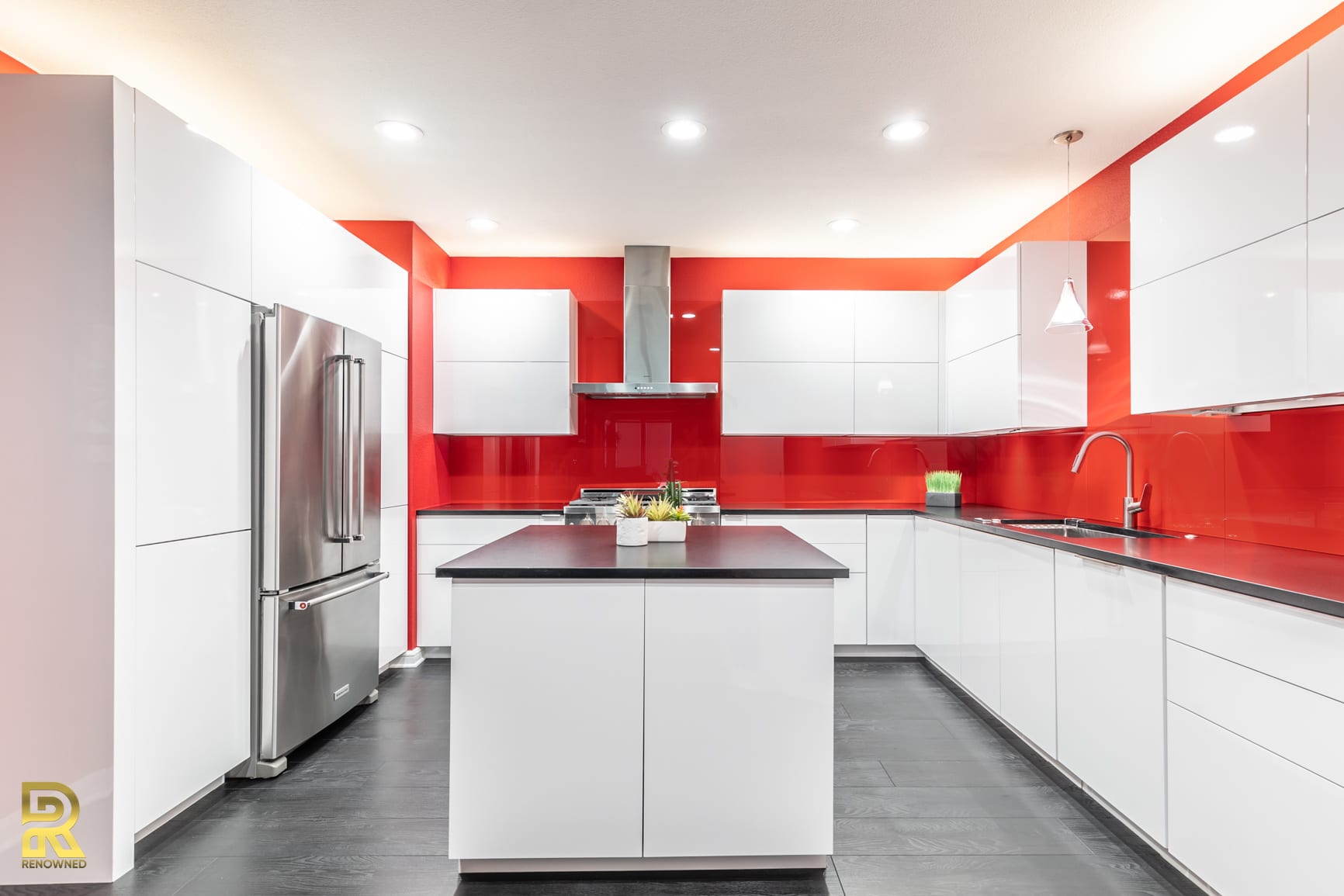 Red Hot Dallas High Rise Condo Kitchen with StyleCraft Cabinets After Remodeling by Renowned Renovation