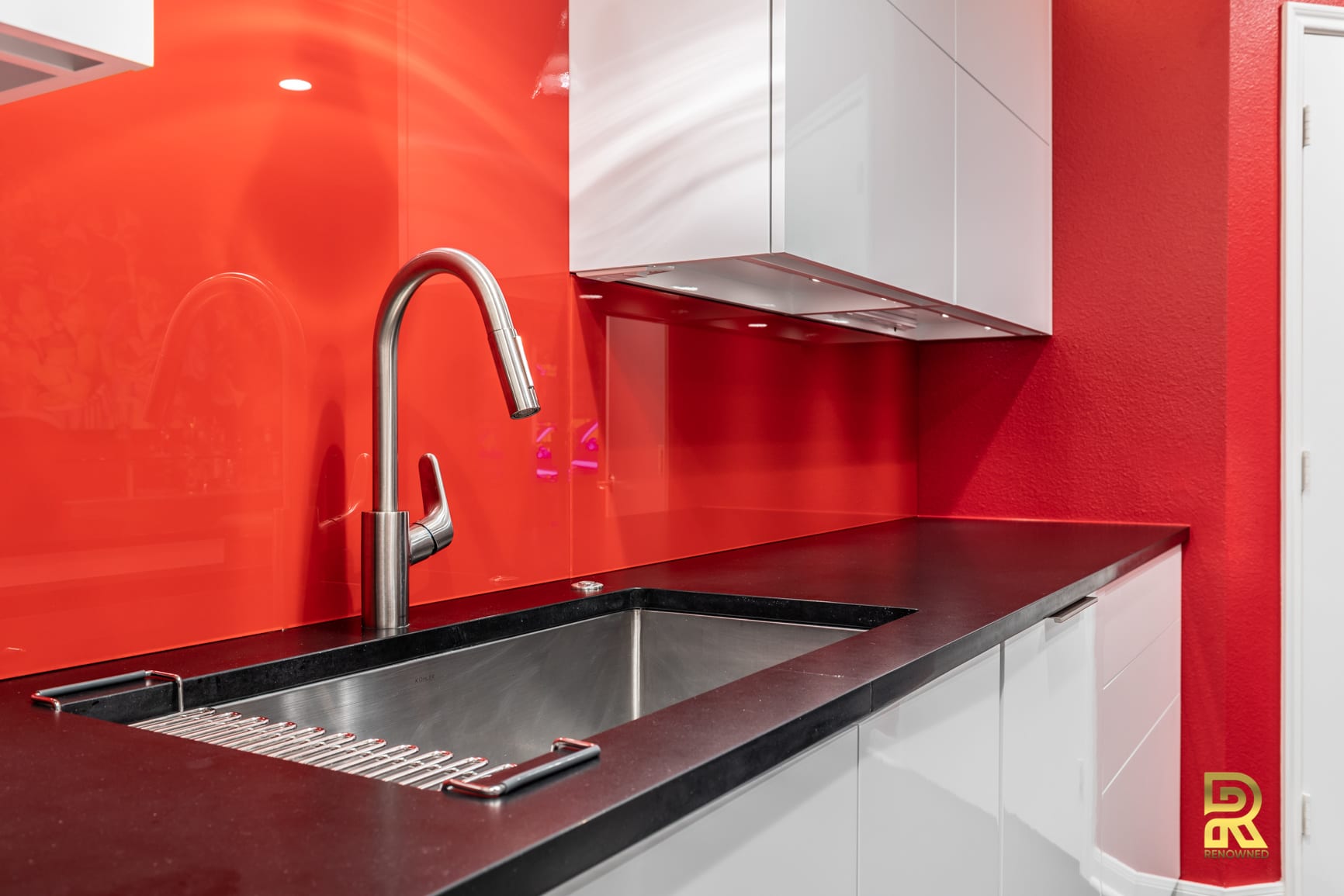 Red Hot Dallas High Rise Condo Kitchen After Remodeling by Renowned Renovation