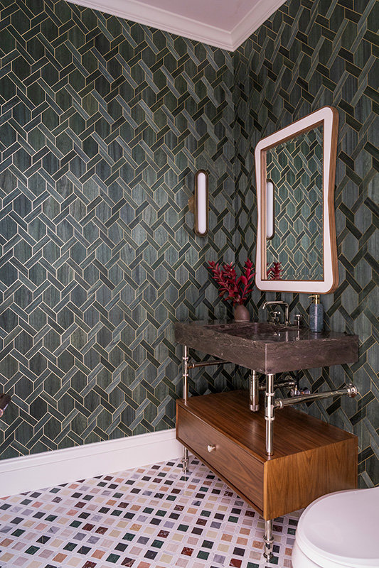Bathroom remodel in Dallas by Renowned Group powder room with green geometric tile and stone vanity