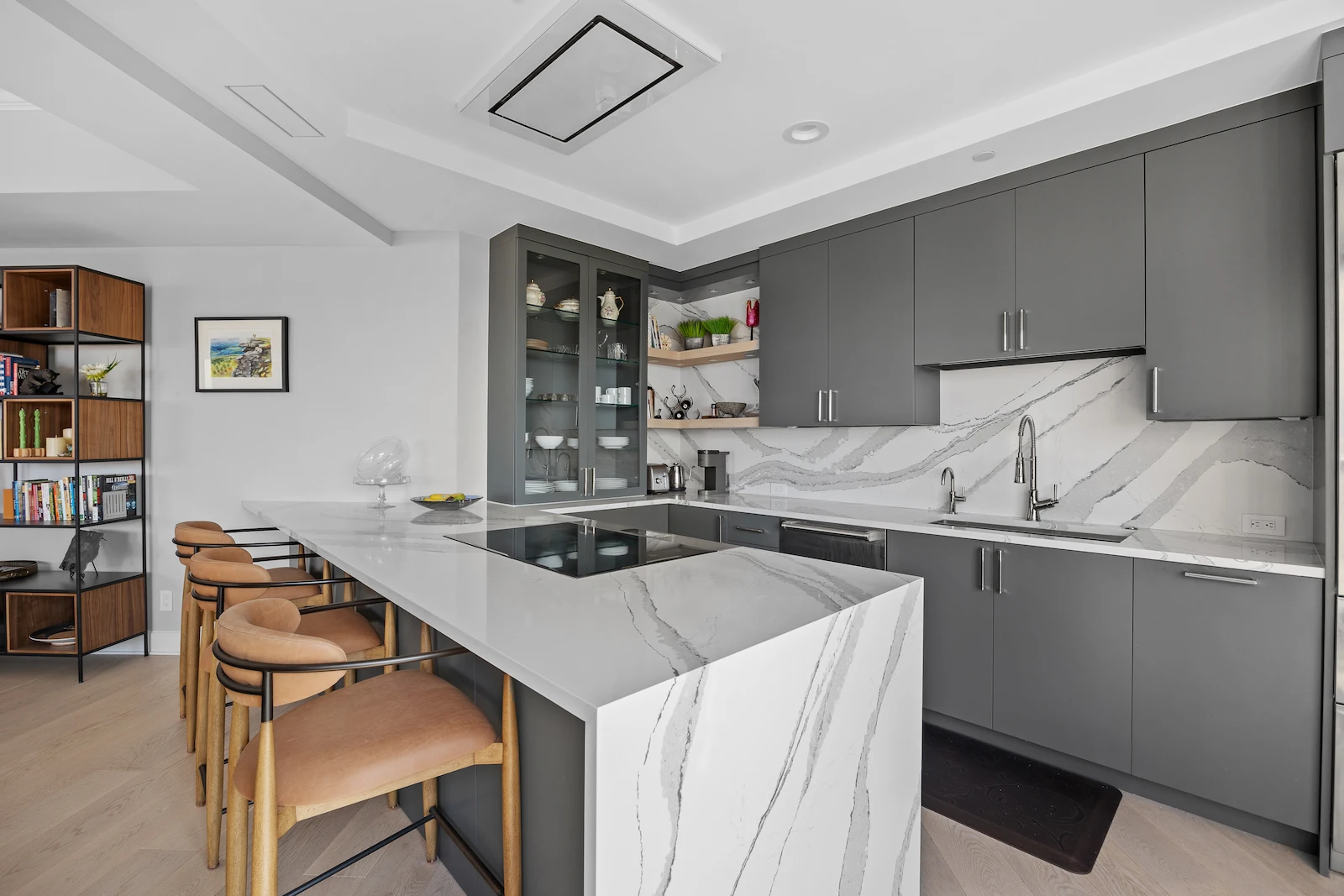 Dallas kitchen remodel by Renowned Group modern gray cabinets with marble waterfall island